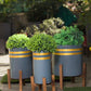 Ribbed pot with wood stand